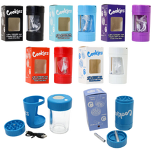 Load image into Gallery viewer, The Cookies Printed 4-in-1 Utility Jar is a versatile storage solution for enthusiasts. It features an LED-lit top that can be activated with two clicks, offering a charging option for the lights. The jar includes a zoom-in function on the top window for enhanced visibility. At the bottom, it houses a grinder and a one-hitter, making it a comprehensive accessory for both storage and use. Made from glass and plastic, it has a volume of 110ml and weighs about 9oz. The package includes one jar, a USB charger,