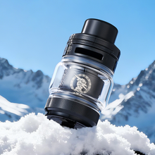 Load image into Gallery viewer, Geekvape Z Subohm Tank 5 with branding in the snow, mountain background