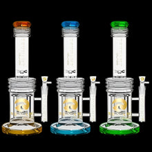 Load image into Gallery viewer, Experience the exceptional craftsmanship of the 17-inch Triple Honeycomb Heart Perc Water Pipe by Tsunami Glass. Its unique features and durable build make it a top choice for smokers.