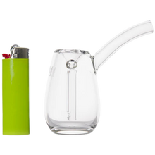 Load image into Gallery viewer, Clear glass smoking device with a green lighter on a white background
